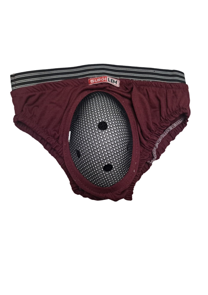 A pair of Surgilem Circumcision Pants designed for post circumcision care and healing, with a football motif by beehive2u.